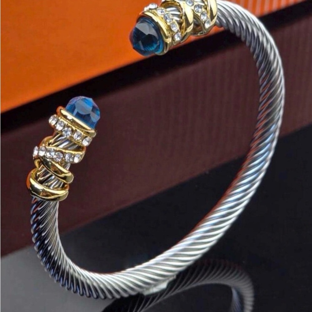 Elegant Silver and Gold Bracelet with Blue Accents